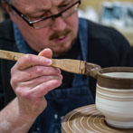 Richard Heeley at work in his pottery in Shropshire Feb 2018